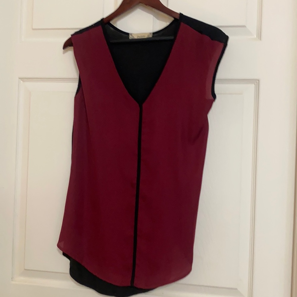 Delaine blouse. Wine and black  Size M. 100% polyester 95% rayon 5% spandex